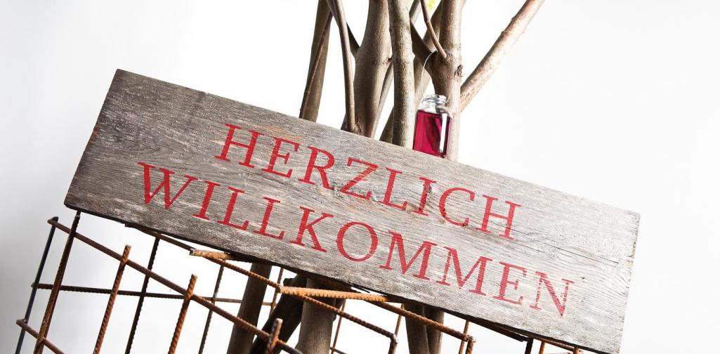 Schild Herzlich Willkommen